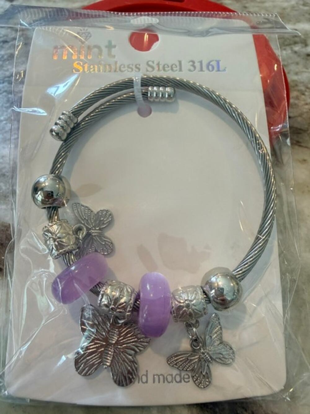 The "St. Thomas" Flutter Charm Bracelet - Stainless Steel and Adjustable